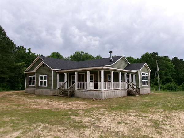 10.9 Acres of Land with Home for Sale in Converse, Louisiana