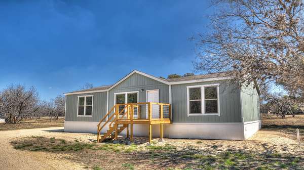 1.87 Acres of Land with Home for Sale in Camp Wood, Texas
