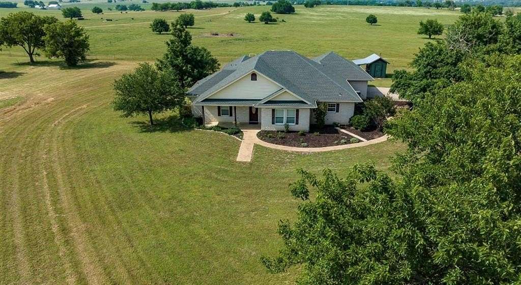 74 Acres of Agricultural Land with Home for Sale in Valley View, Texas