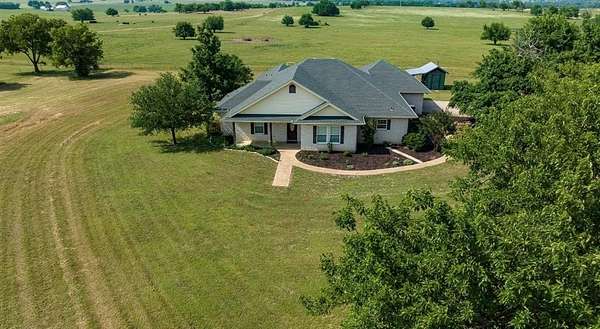 74 Acres of Agricultural Land with Home for Sale in Valley View, Texas