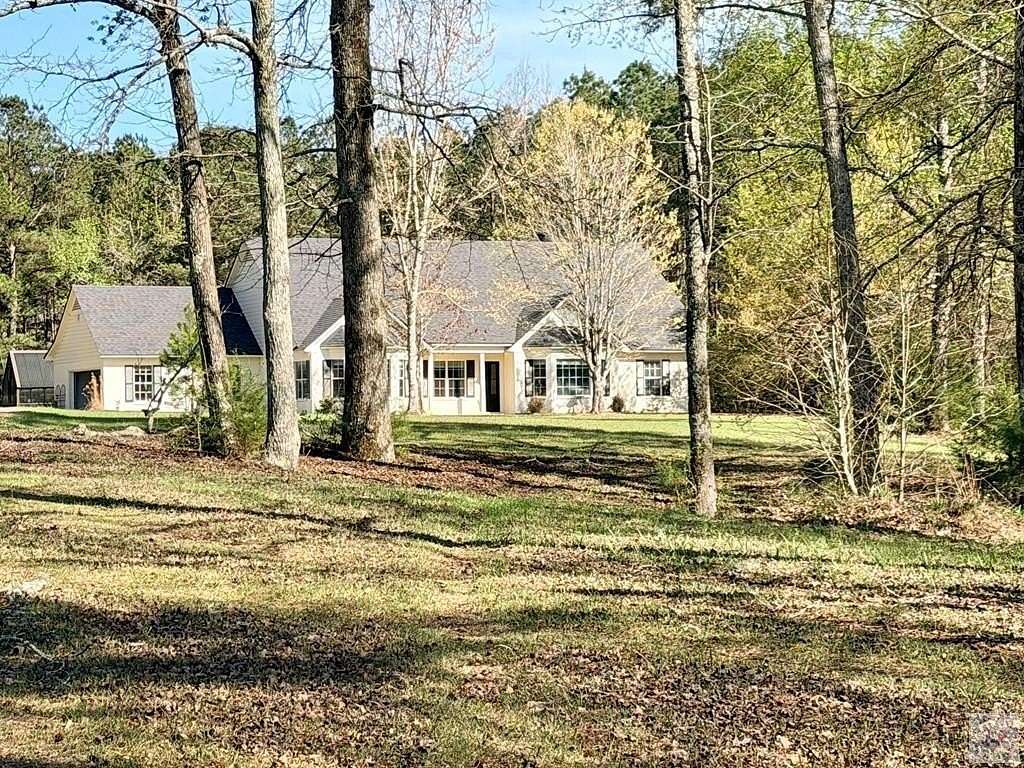13 Acres of Land with Home for Sale in Atlanta, Texas