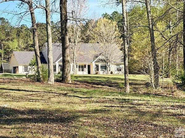 13 Acres of Land with Home for Sale in Atlanta, Texas