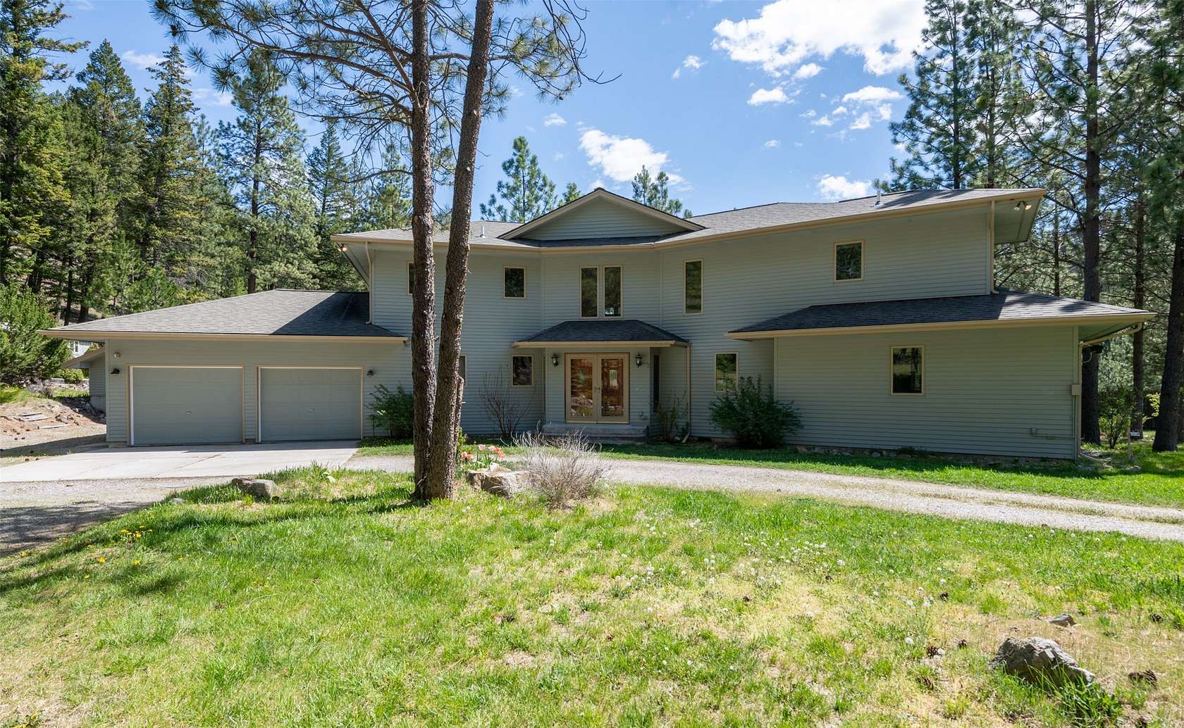 12.3 Acres of Land with Home for Sale in Lolo, Montana