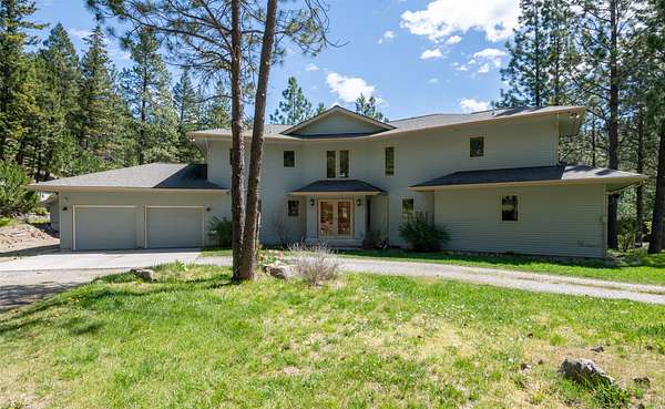 12.3 Acres of Land with Home for Sale in Lolo, Montana