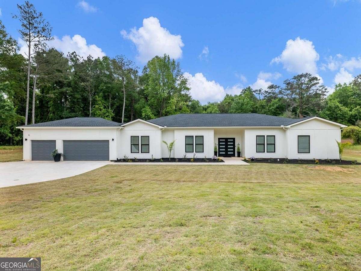 2.73 Acres of Land with Home for Sale in Ellenwood, Georgia