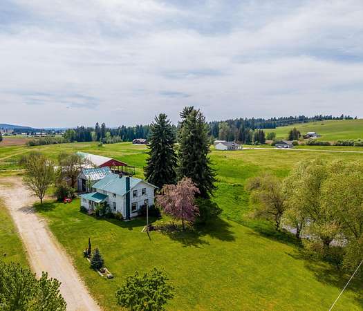 26.5 Acres of Agricultural Land with Home for Sale in Elk, Washington