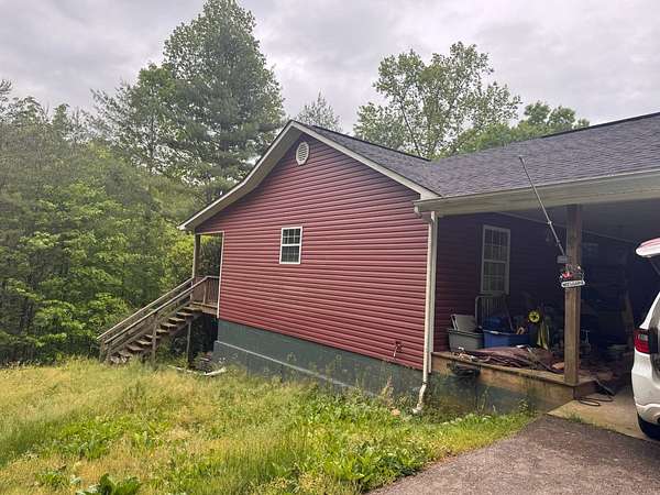5.65 Acres of Land with Home for Sale in Vonore, Tennessee