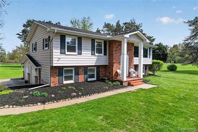 3 Acres of Land with Home for Sale in Ortonville, Michigan