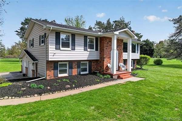 3 Acres of Land with Home for Sale in Ortonville, Michigan