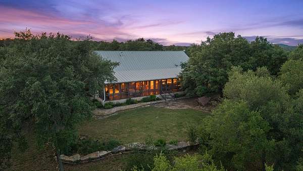 25.3 Acres of Agricultural Land with Home for Sale in Blanco, Texas