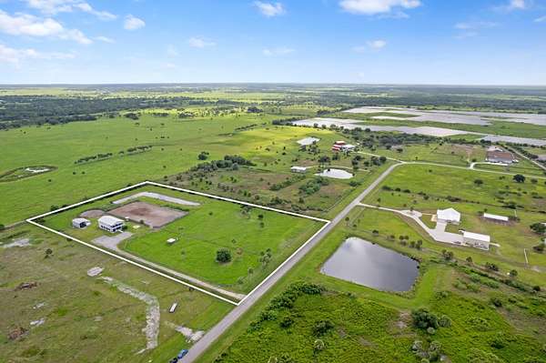 8.65 Acres of Land with Home for Sale in Okeechobee, Florida