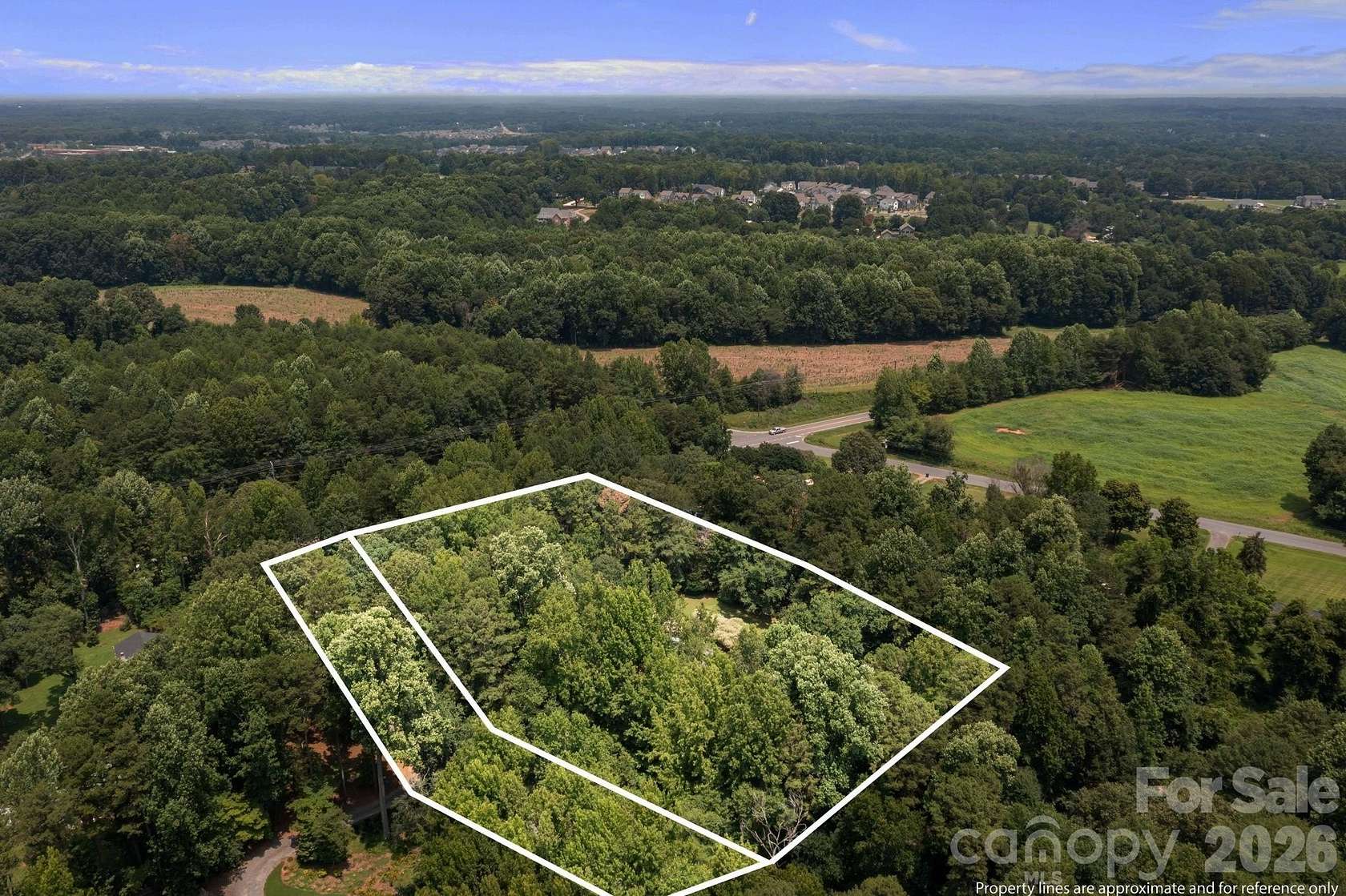 2.44 Acres of Land with Home for Sale in Huntersville, North Carolina