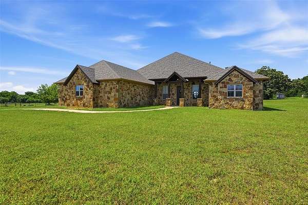 26.8 Acres of Agricultural Land with Home for Sale in Grandview, Texas