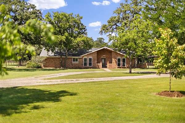 2.5 Acres of Land with Home for Sale in Aubrey, Texas