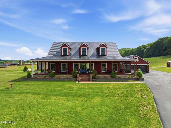 13.2 Acres of Land with Home for Sale in Piney Flats, Tennessee
