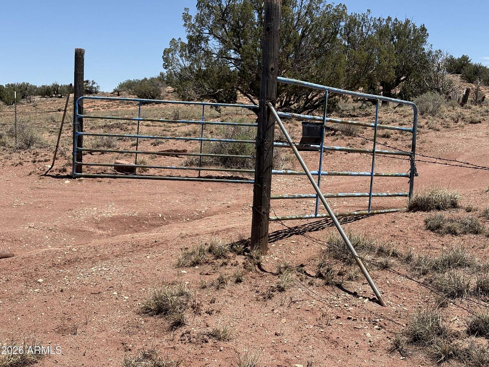 34.8 Acres of Recreational Land with Home for Sale in Concho, Arizona