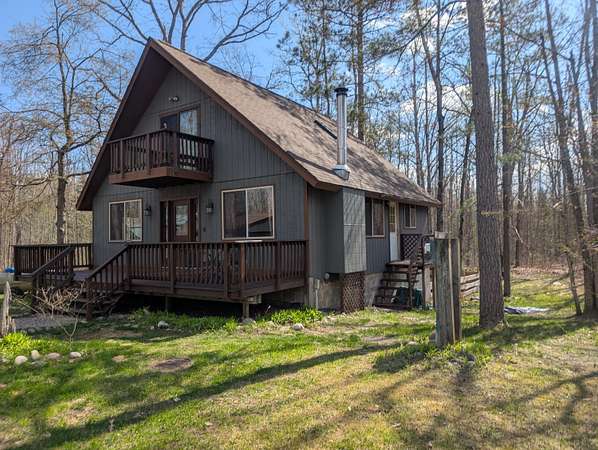 12.5 Acres of Recreational Land with Home for Sale in Atlanta, Michigan