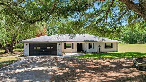 3 Acres of Land with Home for Sale in Weirsdale, Florida
