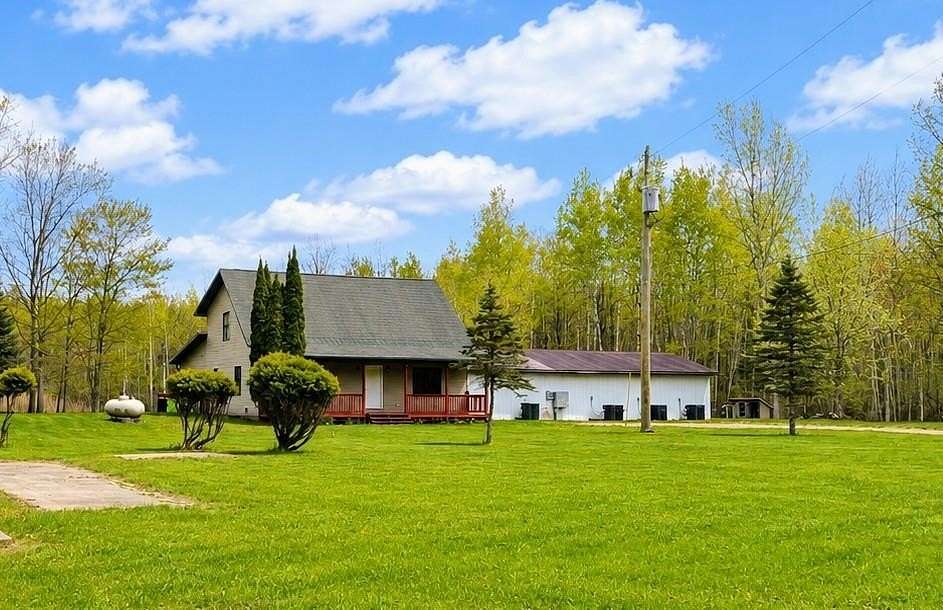 20 Acres of Land with Home for Sale in Beaverton, Michigan