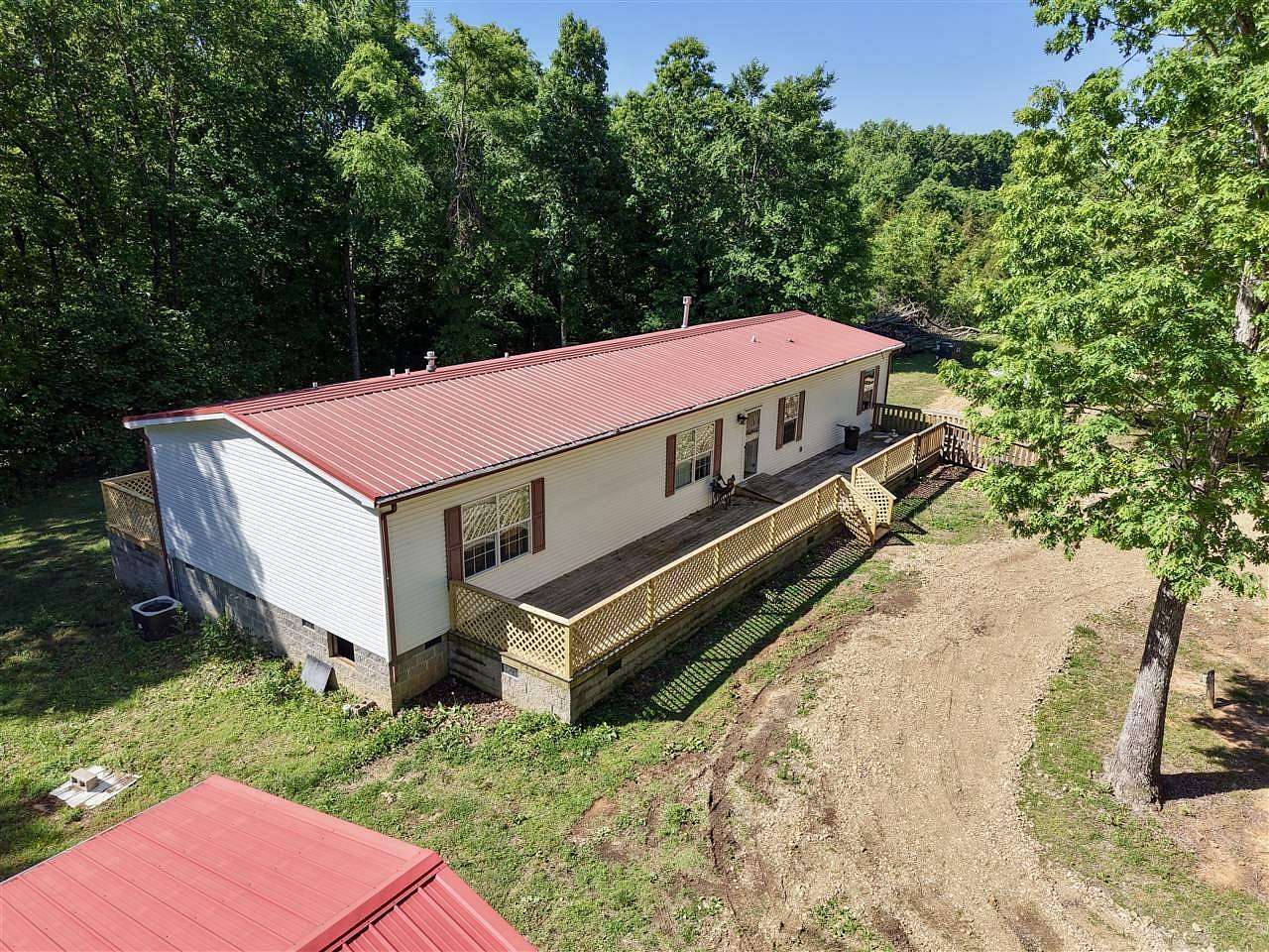 10 Acres of Land with Home for Sale in Adolphus, Kentucky