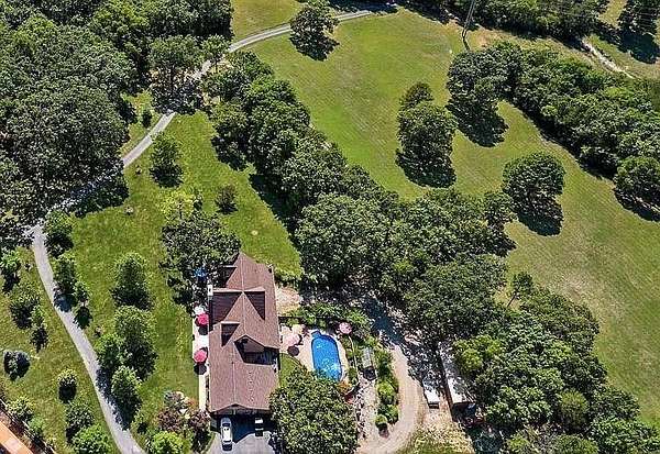 27.6 Acres of Recreational Land with Home for Sale in Eureka Springs, Arkansas