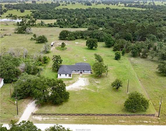 3 Acres of Land with Home for Sale in Bedias, Texas