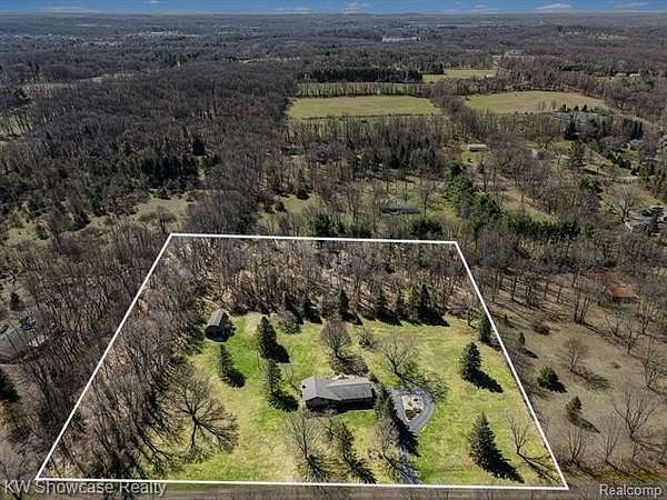 5.19 Acres of Land with Home for Sale in Highland Township, Michigan