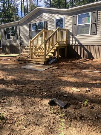 8.84 Acres of Land with Home for Sale in Henderson, Tennessee