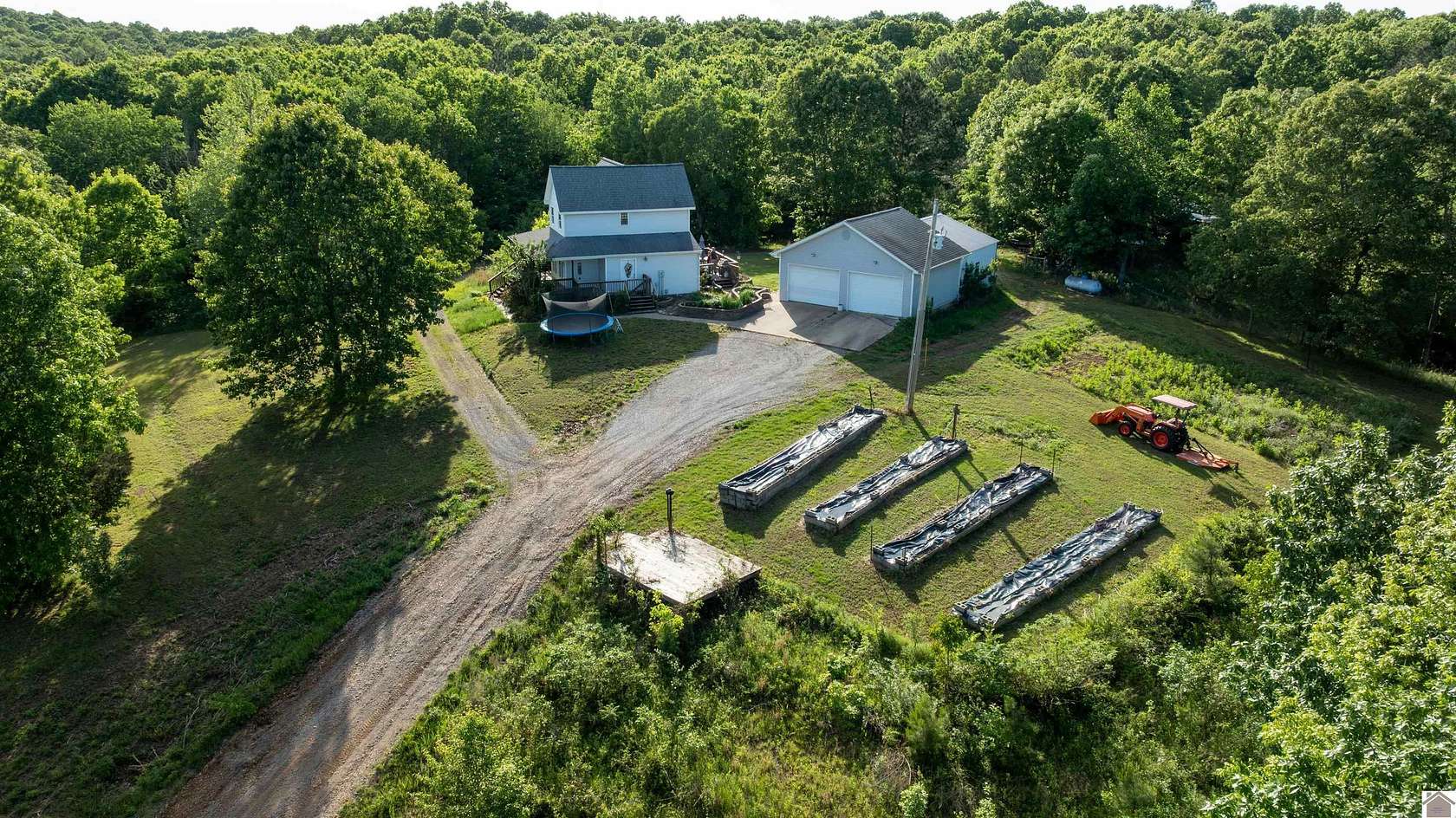 32.5 Acres of Agricultural Land with Home for Sale in Benton, Kentucky