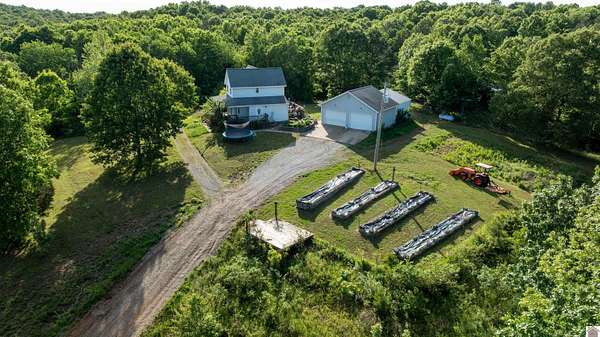 32.5 Acres of Agricultural Land with Home for Sale in Benton, Kentucky