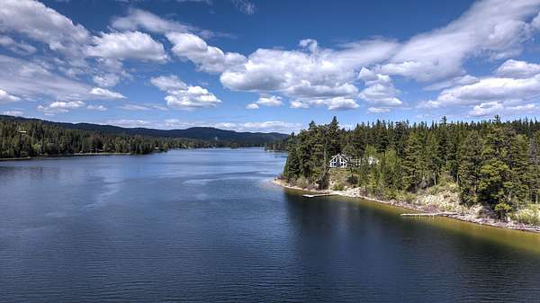 9.4 Acres of Land with Home for Sale in Bigfork, Montana