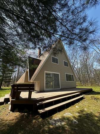 37.2 Acres of Recreational Land with Home for Sale in Irons, Michigan