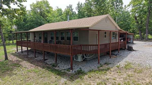 6.6 Acres of Land with Home for Sale in Marion County Township, Arkansas