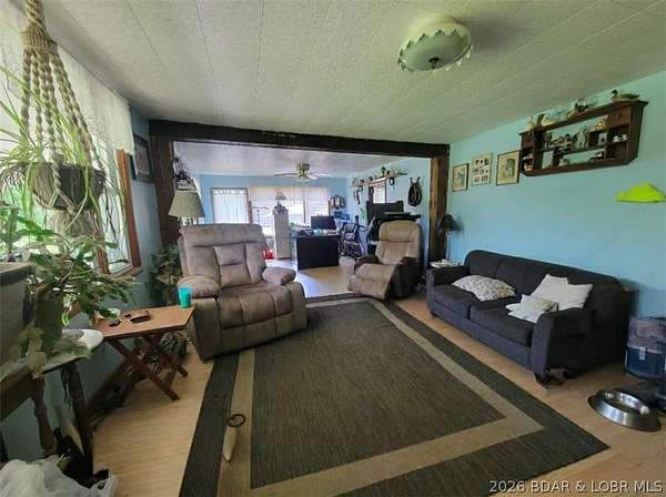 14.2 Acres of Land with Home for Sale in Versailles, Missouri