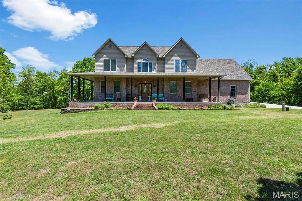 10.2 Acres of Land with Home for Sale in Jackson, Missouri