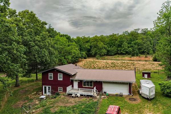 8.39 Acres of Land with Home for Sale in Gatewood, Missouri