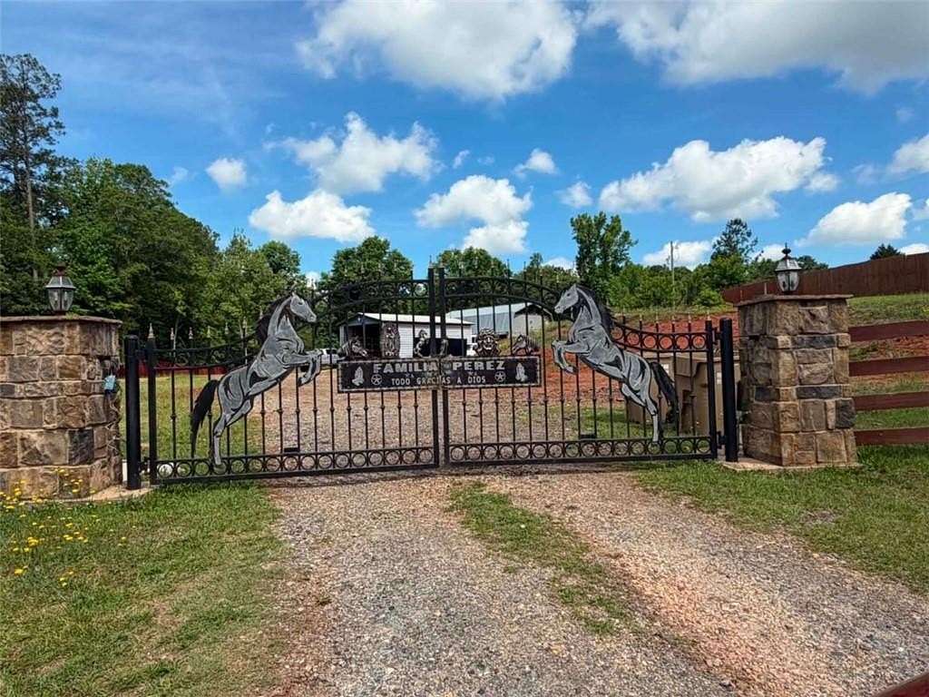 7 Acres of Land with Home for Sale in Jefferson, Georgia