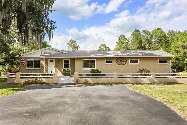 2.36 Acres of Land with Home for Sale in Christmas, Florida
