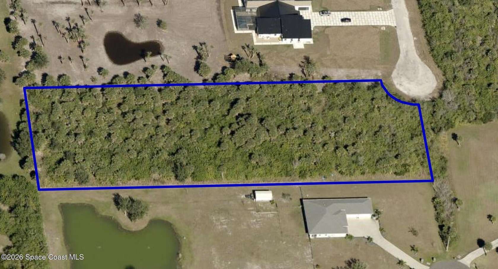 2.64 Acres of Residential Land for Sale in Palm Bay, Florida