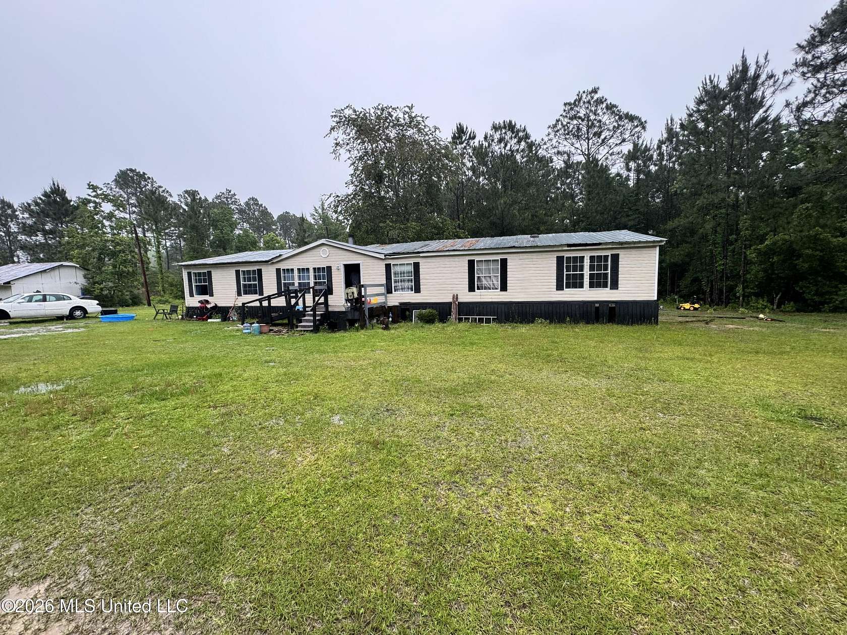 4.5 Acres of Land with Home for Sale in Saucier, Mississippi