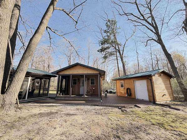 0.98 Acres of Land with Home for Sale in Harrison, Michigan