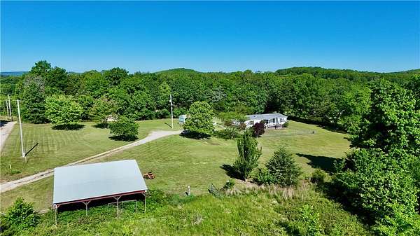 5 Acres of Land with Home for Sale in Harrison, Arkansas