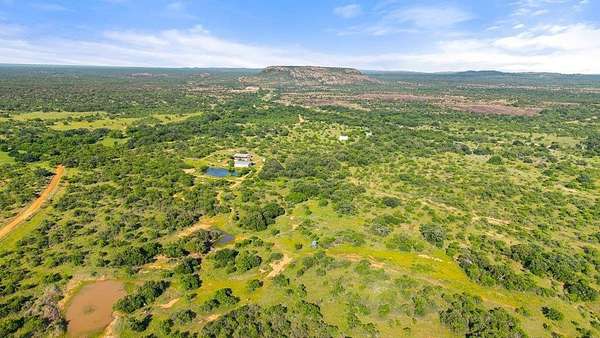 111 Acres of Recreational Land with Home for Sale in Llano, Texas