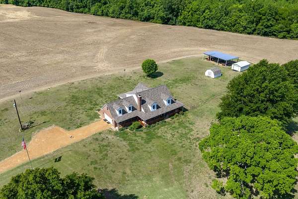 49.2 Acres of Agricultural Land with Home for Sale in Drummonds, Tennessee