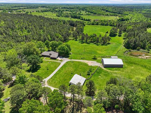 154 Acres of Agricultural Land with Home for Sale in Licking, Missouri