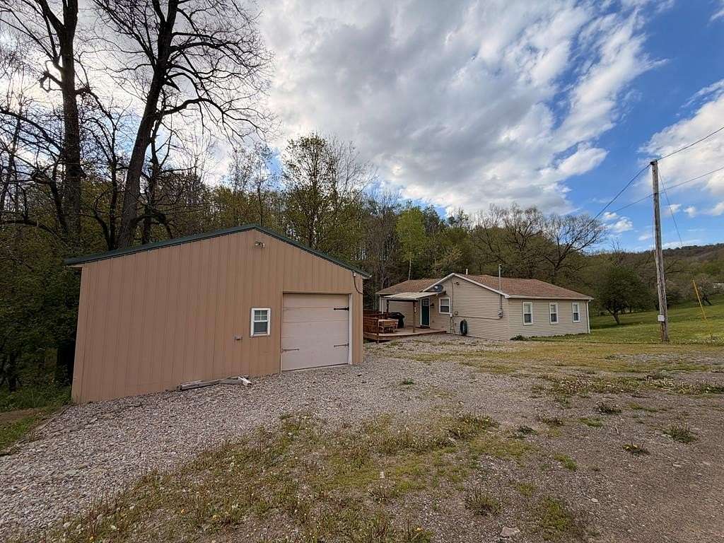 3.12 Acres of Land with Home for Sale in Harrison Valley, Pennsylvania