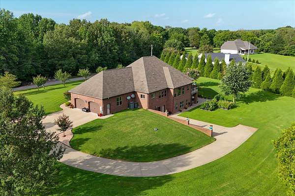 5 Acres of Land with Home for Sale in Adams, Tennessee