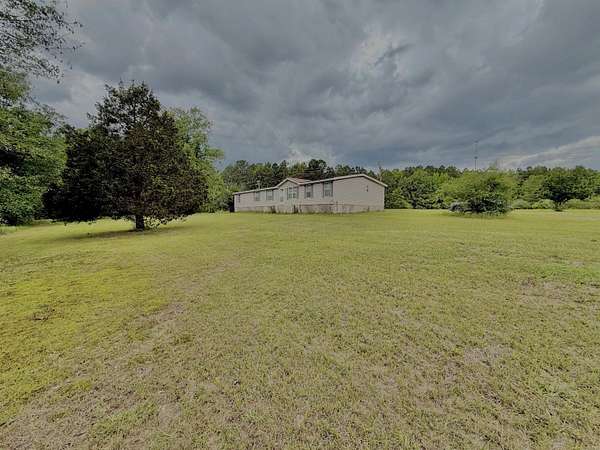 9.5 Acres of Land with Home for Sale in Bearden, Arkansas