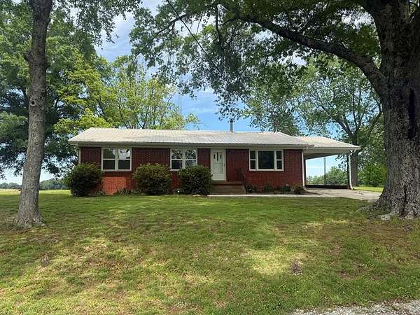1.73 Acres of Land with Home for Sale in McKenzie, Tennessee