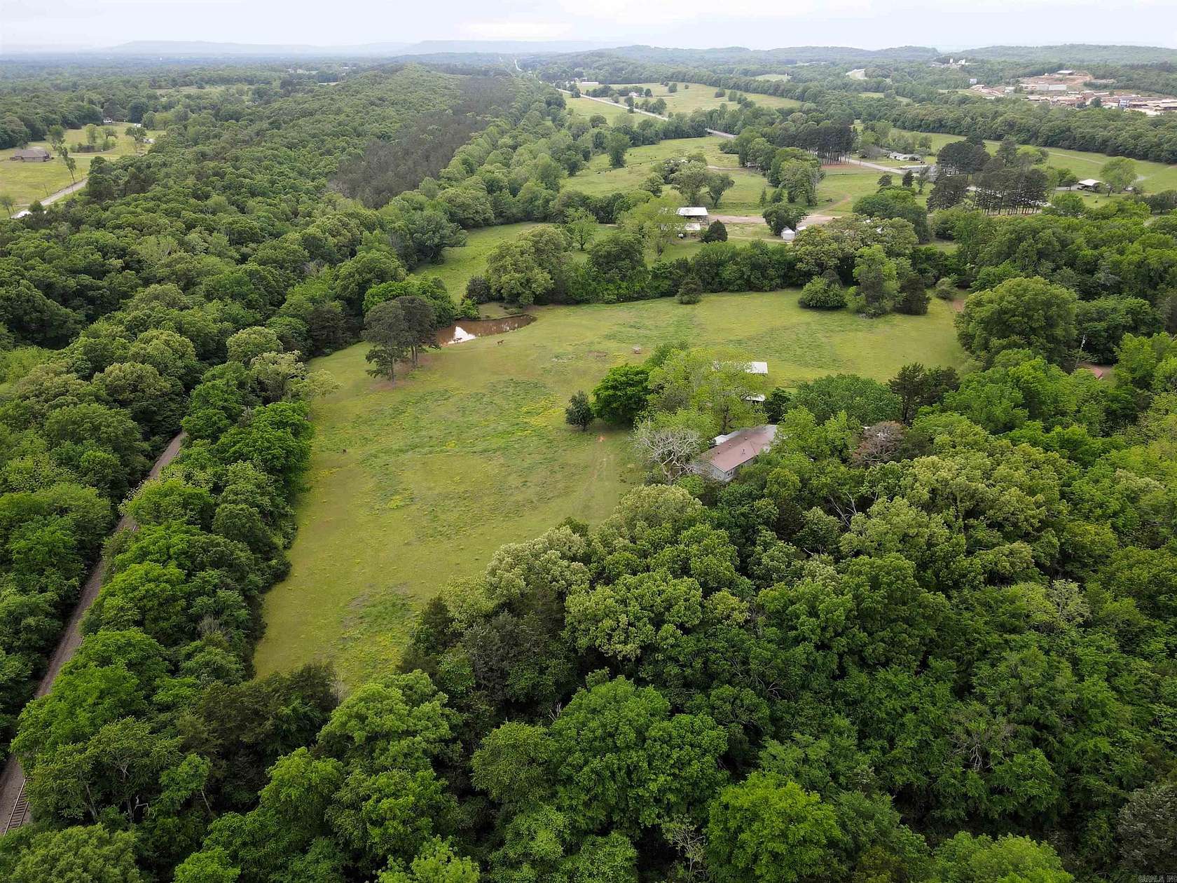 11.5 Acres of Land with Home for Sale in Plumerville, Arkansas